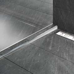 Stainless cover in a slate bathroom